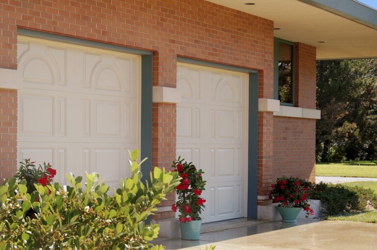 (2) 9' x 7' Impact Resistant Fiberglass Door Almond No Windows