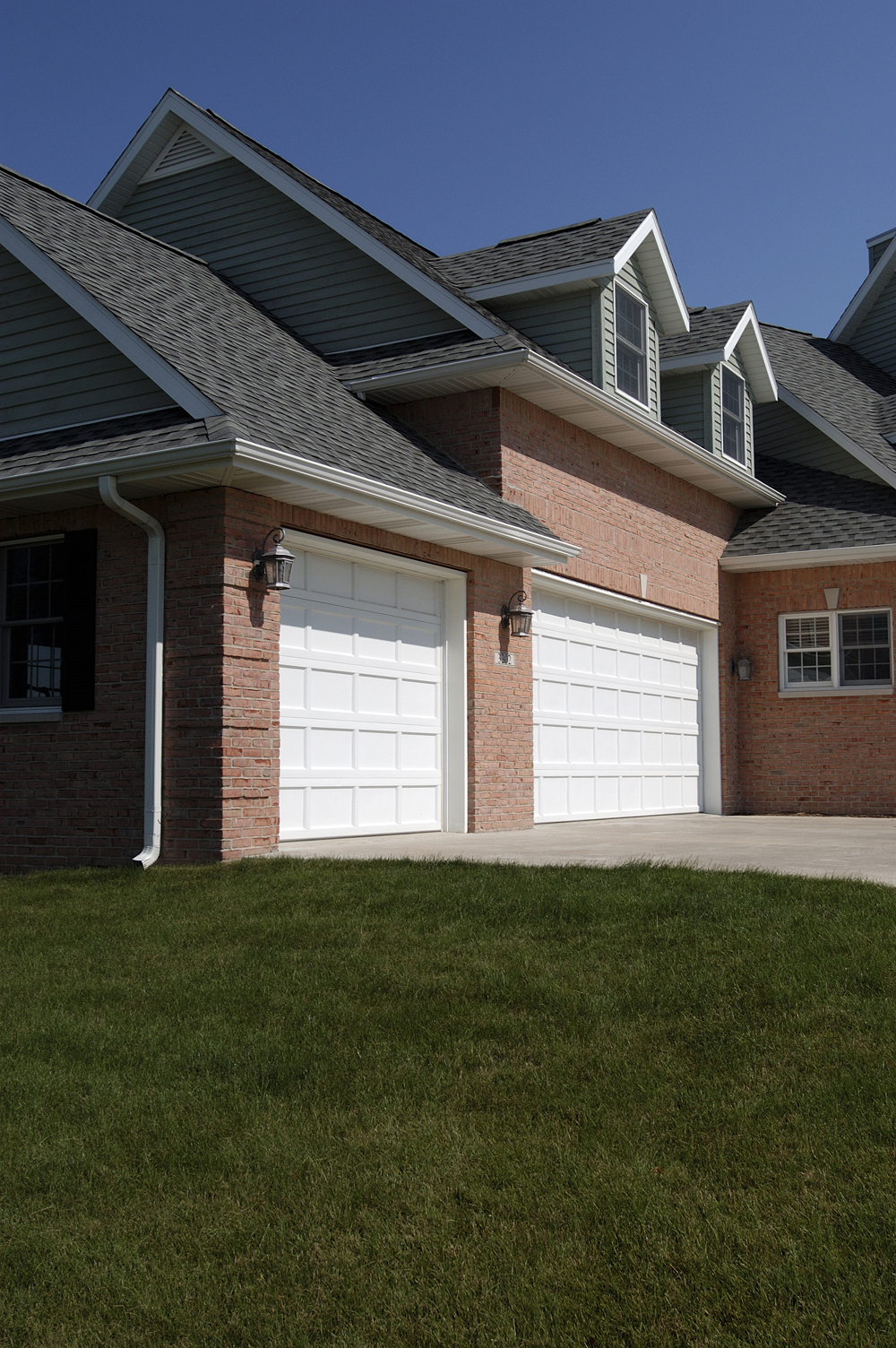A side view of a white contemporary garage door